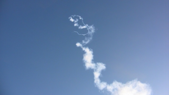 Contrails indicating the variable winds of this straight
        flight