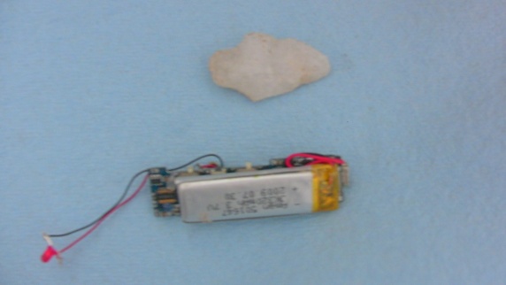 Remainder of Q-Cam with Clovis period arrow head