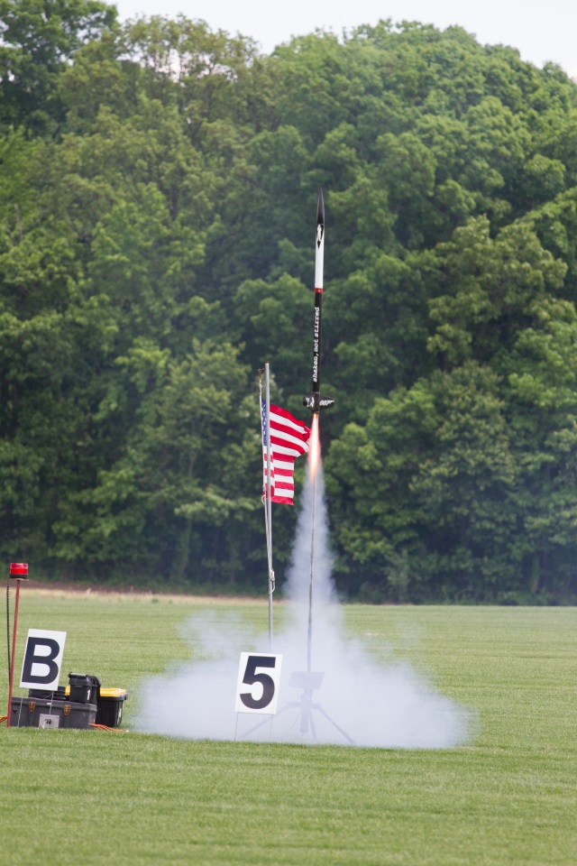 Shaken, Not
        Stirred lifting off on a CTI H120 Red